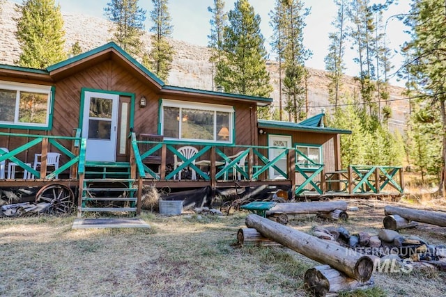 back of property with metal roof