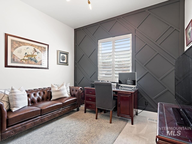 1305 N Big Star Pl, Eagle, ID 83616 - office area with a decorative wall, light carpet, and an accent wall