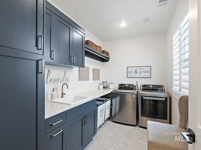 1305 N Big Star Pl, Eagle, ID 83616 - laundry area featuring washer and clothes dryer, cabinet space, and recessed lighting
