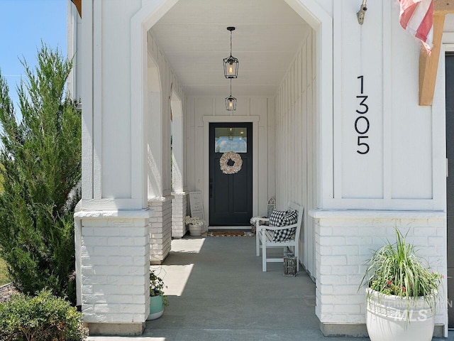 1305 N Big Star Pl, Eagle, ID 83616 - doorway to property featuring covered porch