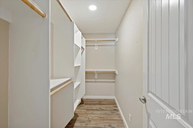 632 N Edgewood Ln, Eagle, ID 83616 - walk in closet with wood finished floors