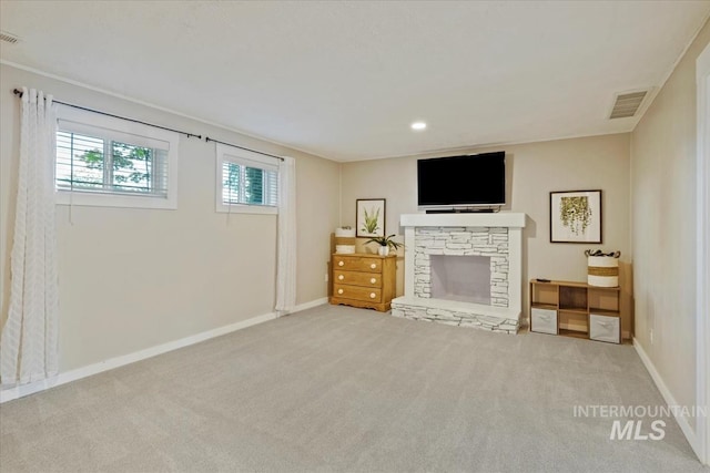 632 N Edgewood Ln, Eagle, ID 83616 - living area with a stone fireplace, carpet flooring, and recessed lighting