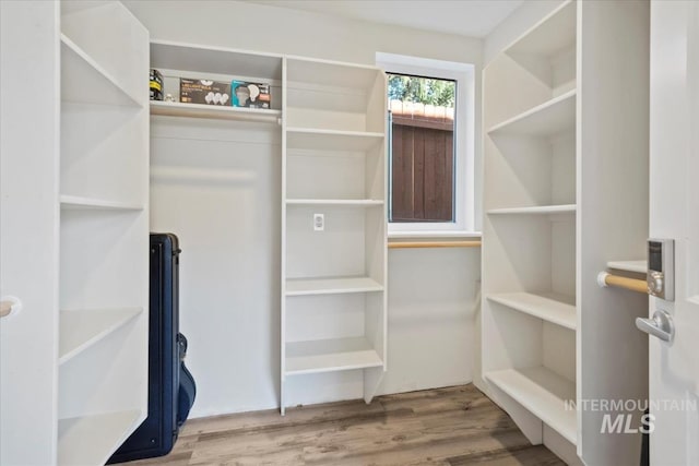 632 N Edgewood Ln, Eagle, ID 83616 - spacious closet featuring wood finished floors