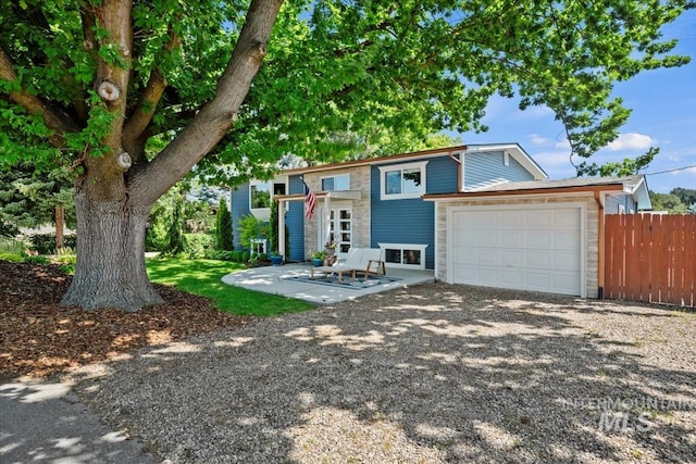632 N Edgewood Ln, Eagle, ID 83616 - view of front of house featuring driveway and a garage