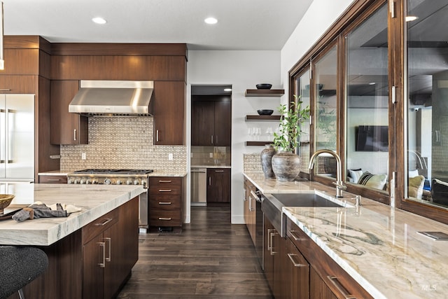 510 W Paso Fino Dr, Boise, ID 83702 - kitchen featuring decorative backsplash, dark wood-type flooring, high quality appliances, and wall chimney exhaust hood