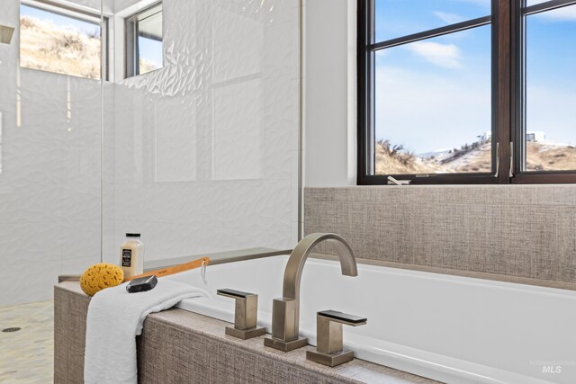 510 W Paso Fino Dr, Boise, ID 83702 - bathroom with tile walls