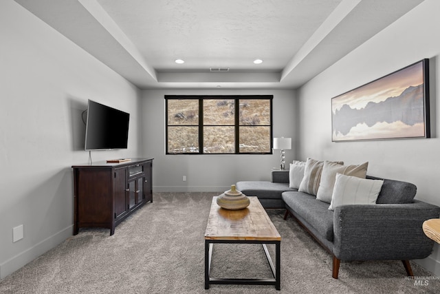 510 W Paso Fino Dr, Boise, ID 83702 - carpeted living room featuring a raised ceiling and a textured ceiling