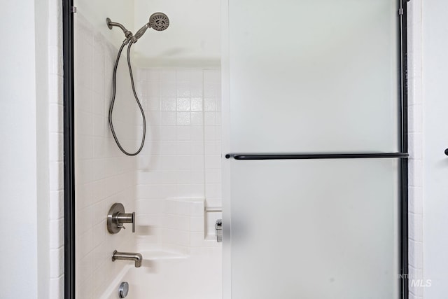 bathroom featuring enclosed tub / shower combo