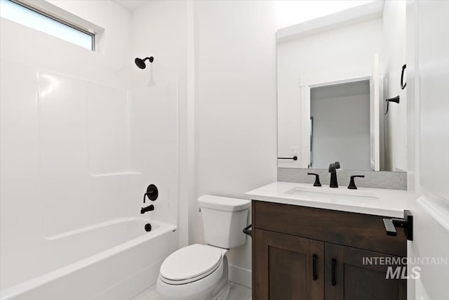 full bathroom featuring toilet, shower / bath combination, and vanity