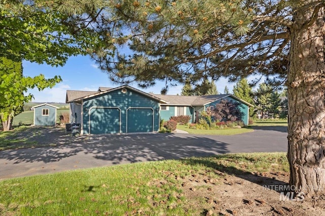 ranch-style house with a garage