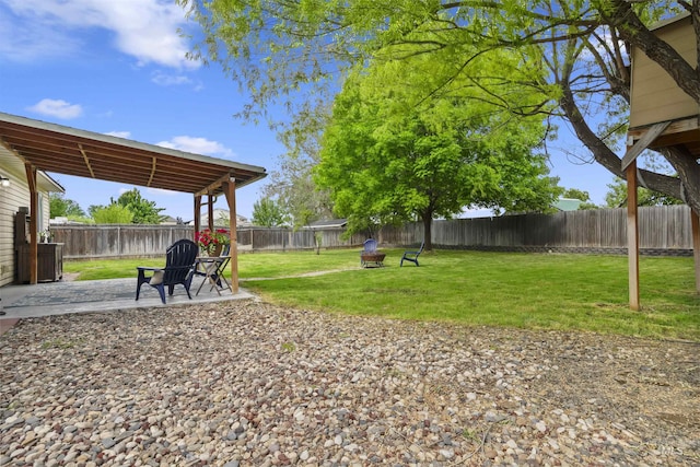 5609 Landsdown Ave, Caldwell, ID 83607 - view of yard with a patio area and a fire pit