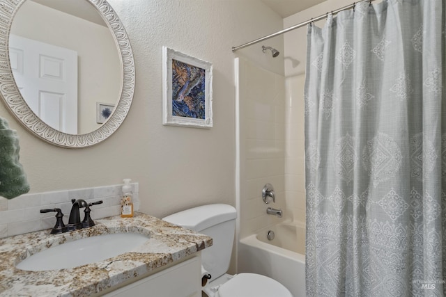 5609 Landsdown Ave, Caldwell, ID 83607 - bathroom with toilet, shower / bath combination with curtain, decorative backsplash, and vanity