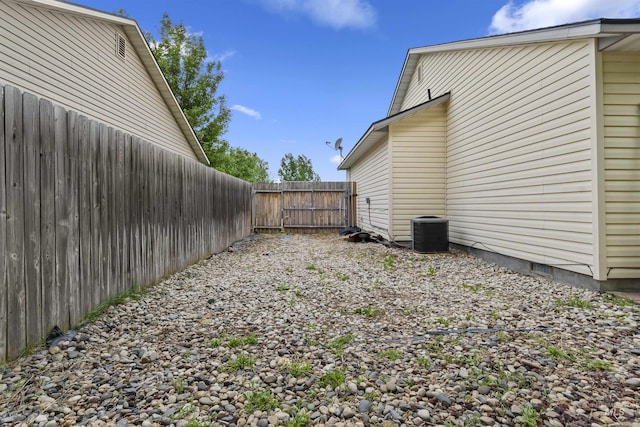 5609 Landsdown Ave, Caldwell, ID 83607 - view of yard featuring fence and central air condition unit