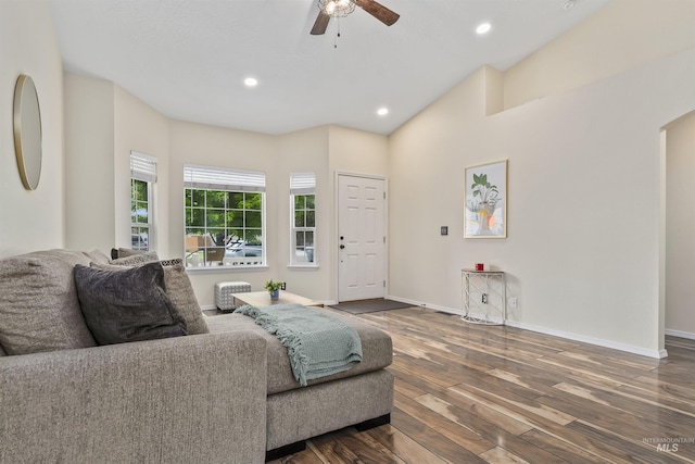 5609 Landsdown Ave, Caldwell, ID 83607 - living area featuring wood-type flooring, a ceiling fan, baseboards, recessed lighting, and arched walkways