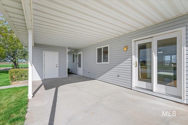 view of patio / terrace featuring an attached carport