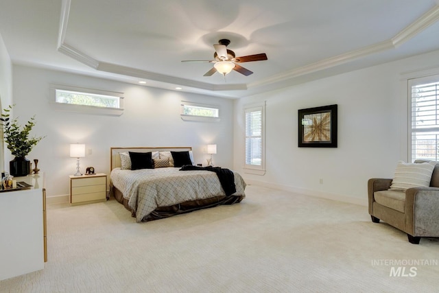 2581 N Tricia Way, Meridian, ID 83646 - bedroom featuring a raised ceiling, light carpet, crown molding, baseboards, and ceiling fan