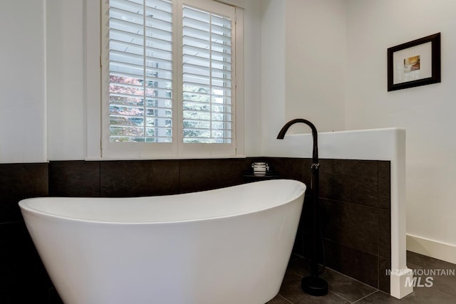 2581 N Tricia Way, Meridian, ID 83646 - full bath with a freestanding tub, tile walls, and tile patterned flooring