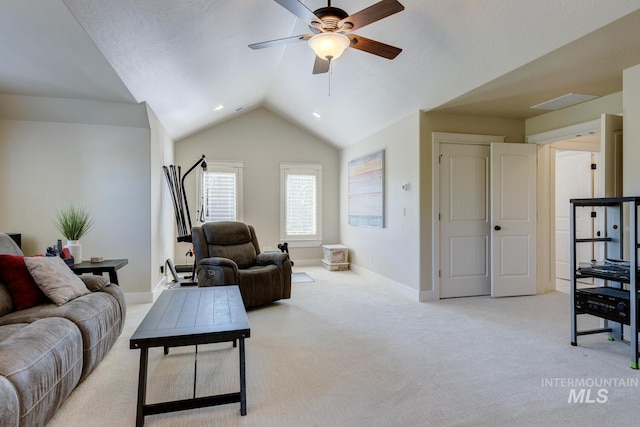 2581 N Tricia Way, Meridian, ID 83646 - living room with a ceiling fan, lofted ceiling, light carpet, and baseboards