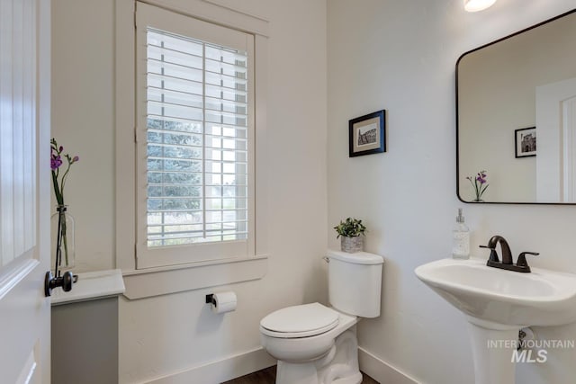 2581 N Tricia Way, Meridian, ID 83646 - bathroom featuring baseboards and toilet