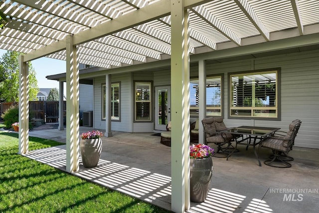 2581 N Tricia Way, Meridian, ID 83646 - view of patio featuring fence, a pergola, outdoor dining area, and central AC
