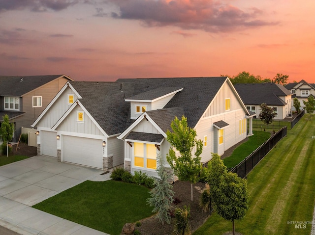 2255 N Sugar Loop Ave, Star, ID 83669 - view of front of property featuring board and batten siding, a shingled roof, concrete driveway, and a garage