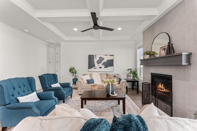 2255 N Sugar Loop Ave, Star, ID 83669 - living area featuring coffered ceiling, a tiled fireplace, ceiling fan, beamed ceiling, and crown molding
