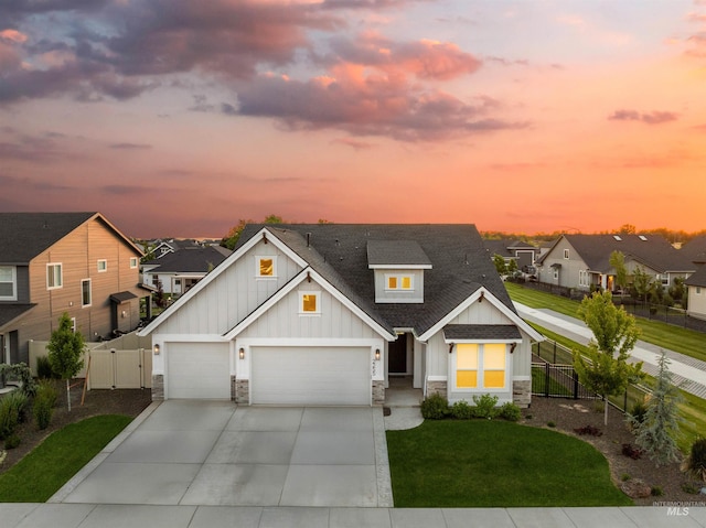 2255 N Sugar Loop Ave, Star, ID 83669 - view of front of home featuring board and batten siding, stone siding, a residential view, and a gate