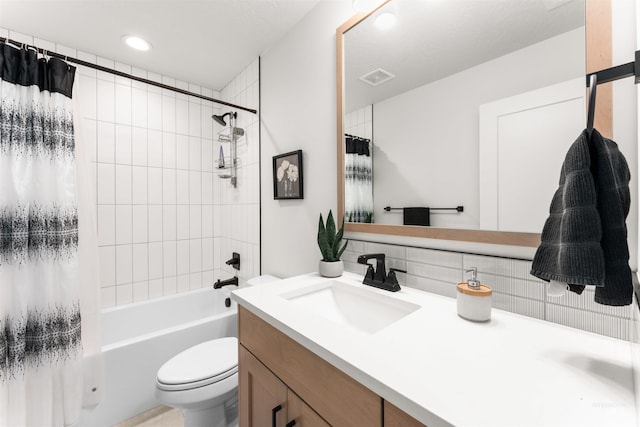2255 N Sugar Loop Ave, Star, ID 83669 - bathroom with vanity, decorative backsplash, shower / tub combo with curtain, and recessed lighting