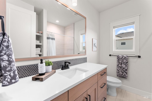 2255 N Sugar Loop Ave, Star, ID 83669 - full bathroom with vanity, curtained shower, and recessed lighting
