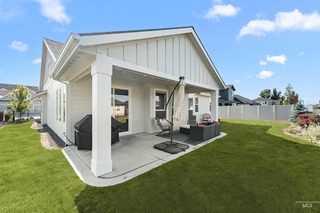 2255 N Sugar Loop Ave, Star, ID 83669 - back of house with board and batten siding, a patio, and outdoor lounge area