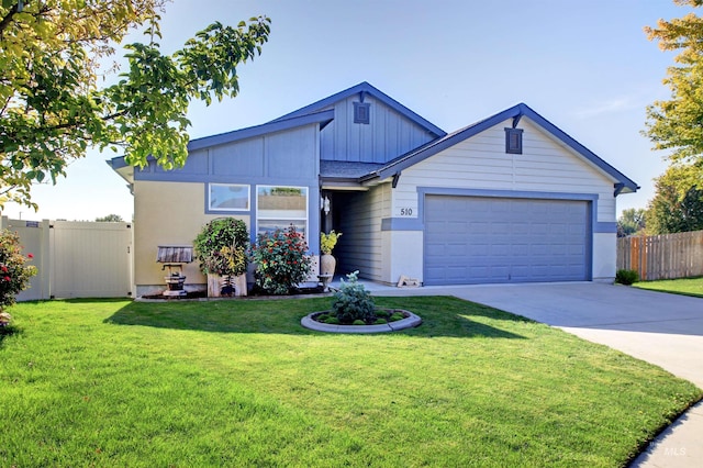 view of front of house featuring board and batten siding, fence, driveway, and a front lawn