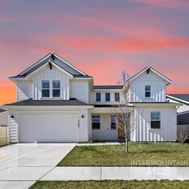 2065 Sombrero Ave, Middleton, ID 83644 - view of front of house featuring board and batten siding, concrete driveway, a garage, and covered porch