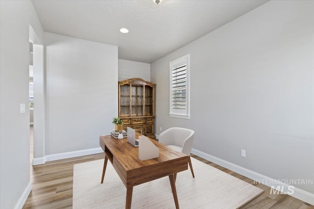 2065 Sombrero Ave, Middleton, ID 83644 - home office with light wood-style floors and recessed lighting
