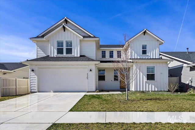 2065 Sombrero Ave, Middleton, ID 83644 - view of front of property featuring board and batten siding, concrete driveway, a garage, and a shingled roof