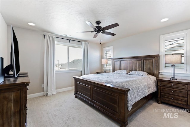 2065 Sombrero Ave, Middleton, ID 83644 - bedroom with light carpet, a ceiling fan, and recessed lighting