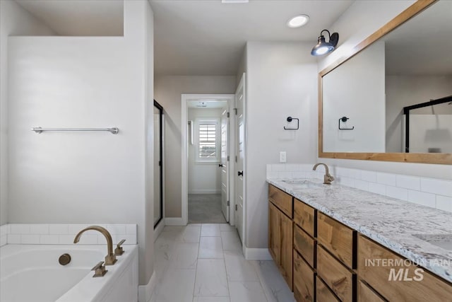 2065 Sombrero Ave, Middleton, ID 83644 - full bathroom featuring double vanity, a shower stall, and a garden tub