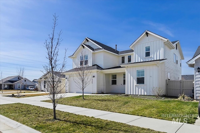 2065 Sombrero Ave, Middleton, ID 83644 - modern farmhouse style home featuring board and batten siding, driveway, and an attached garage