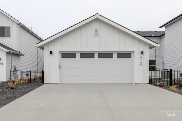 6760 S Cheyenne Ave, Boise, ID 83709 - garage with concrete driveway and fence