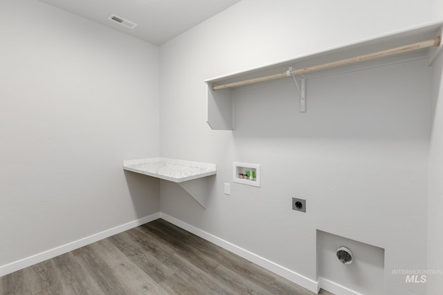 6760 S Cheyenne Ave, Boise, ID 83709 - kitchen with baseboards, light wood-type flooring, appliances with stainless steel finishes, and a sink