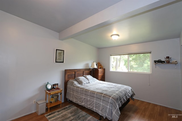 34 Locust Dr, Orofino, ID 83544 - bedroom with wood finished floors, beam ceiling, and baseboards