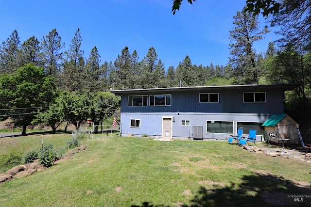 34 Locust Dr, Orofino, ID 83544 - back of house featuring a yard and cooling unit