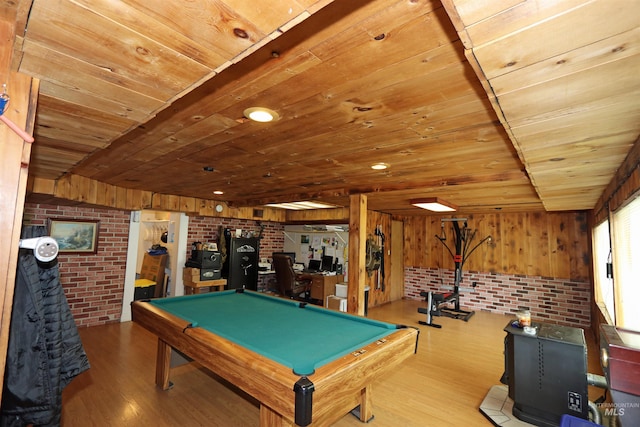 34 Locust Dr, Orofino, ID 83544 - playroom featuring a wood stove, wood ceiling, brick wall, wood finished floors, and pool table