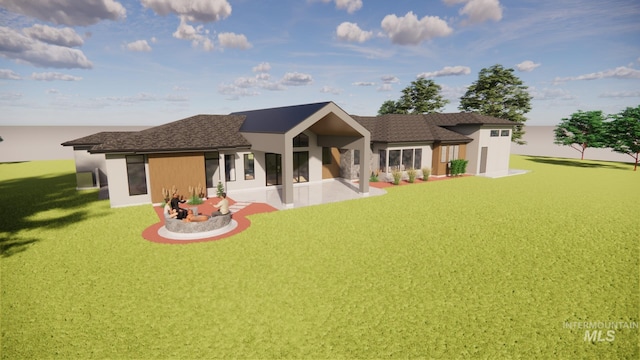 rear view of property featuring a yard and stucco siding