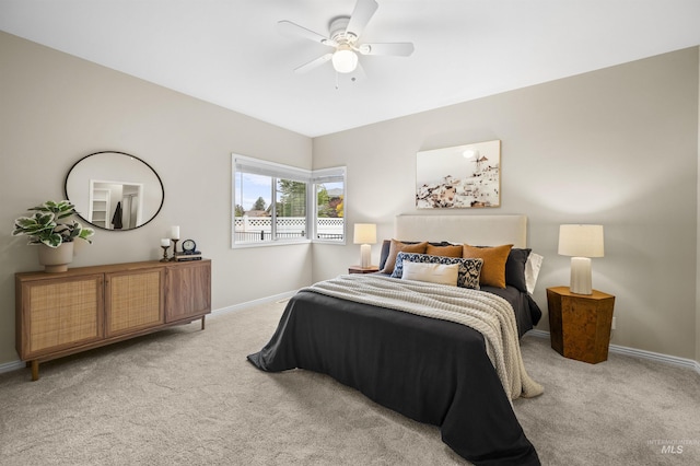 380 S Golden Eagle Ln, Eagle, ID 83616 - carpeted bedroom with baseboards and a ceiling fan