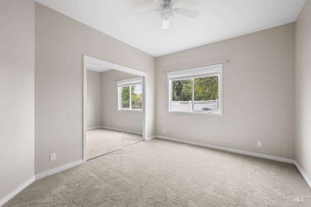 380 S Golden Eagle Ln, Eagle, ID 83616 - unfurnished bedroom with carpet flooring, a closet, and ceiling fan