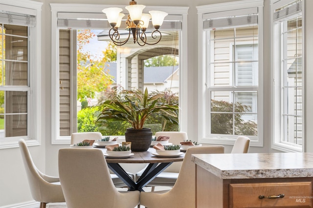 380 S Golden Eagle Ln, Eagle, ID 83616 - dining room with a chandelier