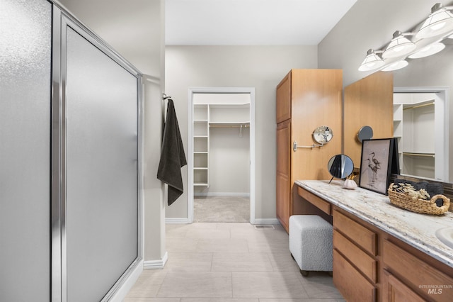 380 S Golden Eagle Ln, Eagle, ID 83616 - full bath featuring a shower stall, a spacious closet, and vanity
