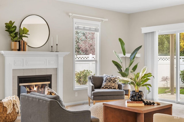380 S Golden Eagle Ln, Eagle, ID 83616 - living room featuring light colored carpet and a tile fireplace