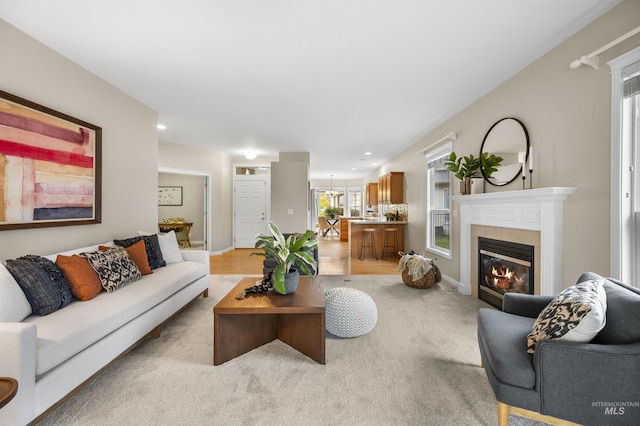 380 S Golden Eagle Ln, Eagle, ID 83616 - living room featuring a tiled fireplace and recessed lighting