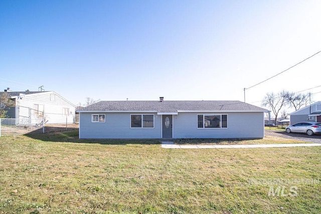 single story home featuring a front yard